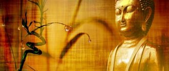 Buddha on a background of bamboo