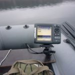 Echo sounder attached to a boat in the water