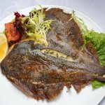 How to cook flounder deliciously in a frying pan, in the oven, or in a slow cooker. Recipe with caviar, potatoes, vegetables, sour cream 