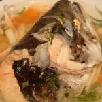 Fish soup from salmon head in a plate